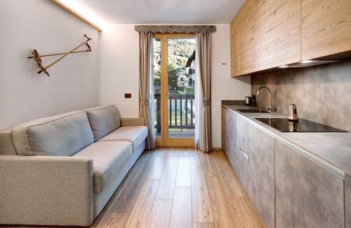Bormio Apartment | Apartment "Baita Emilia e Daniele 11" with Mountain Views, Balconies, and Wi-Fi