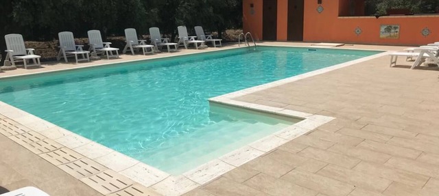 2 Bedrooms Modern Apartment by the SEA, Pool, Wi-Fi, A/C, Terrace, in resort in Campofelice Di Roccella