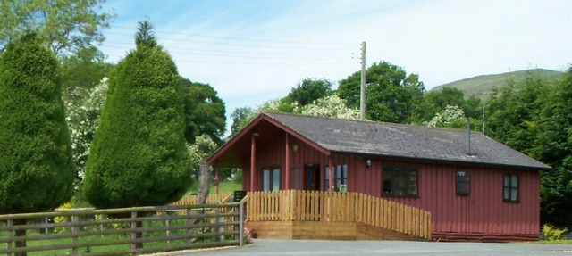 Attractive Timber Chalet In The Upper Tanat Valley. Sleeps 4. in Llanrhaeadr Ym Mochnant