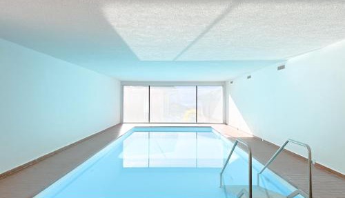 Bright Tiny Studio - Shared Pool & Sauna - Free Parking - Air condition in Muralto