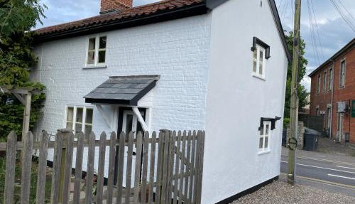 Central Grade 2 listed cottage in Attleborough
