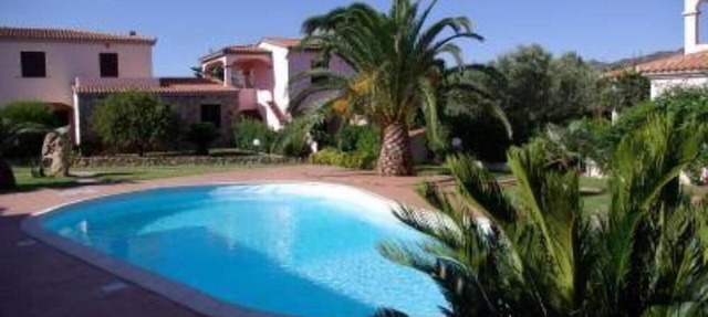 COMFORTABLE apartment with large veranda overlooking the pool. in San Teodoro