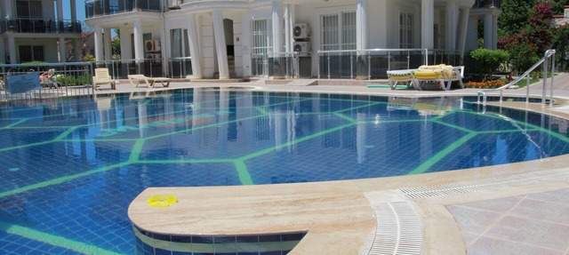 Ground Floor Apartment on a private complex with gardens and swimming pool in Fethiye