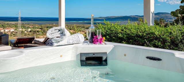 Panoramic Holiday Apartment "Isuledda" with Sea View, Shared Pool & Air Conditioning in San Teodoro