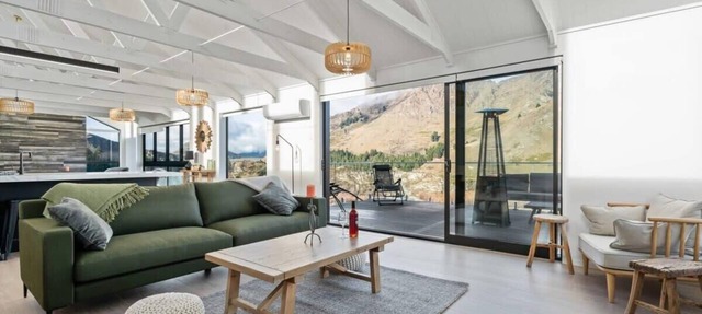 Riverfront Chateau with Stunning Mountain Views in Queenstown
