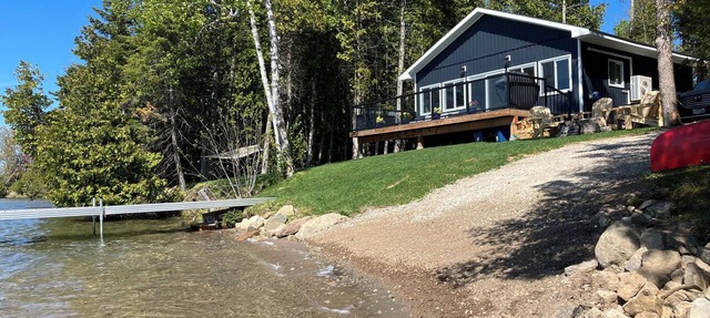 Sunset Cottage with private beach area, fire pit, kayak and canoe! in Sheguiandah