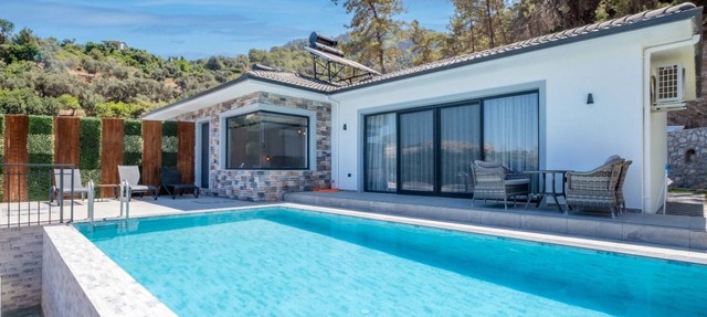 Villa mit Infinitypool in Fethiye Faralya by Interhome in Ölüdeniz
