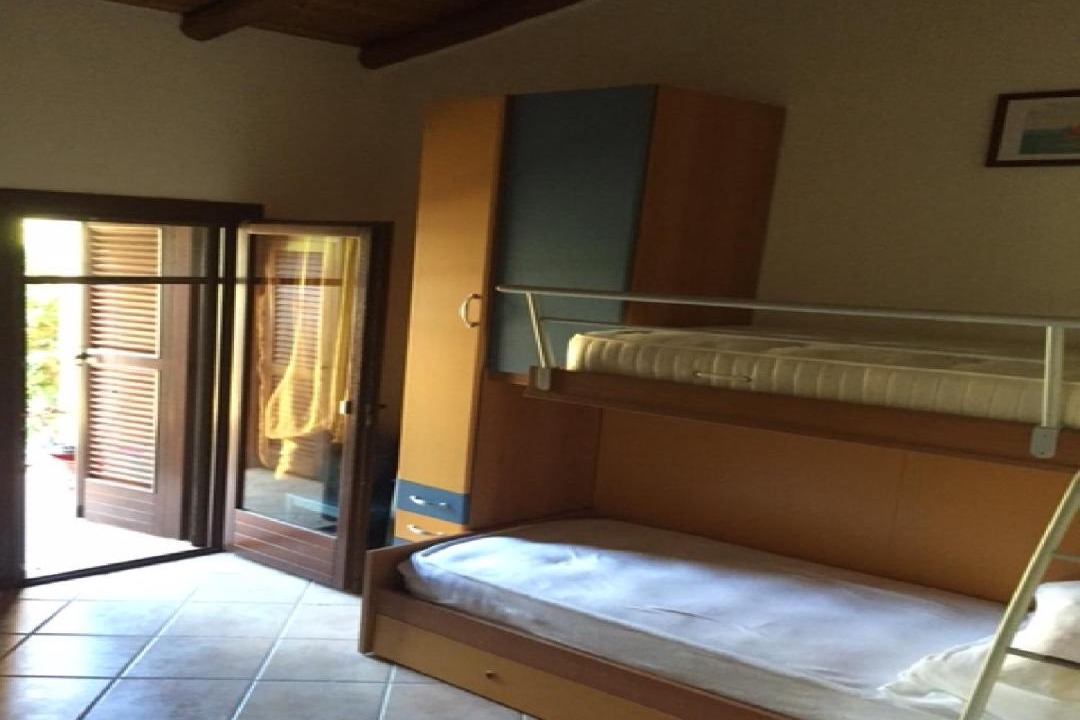Photo of Bedroom in Case Peschiera-Lu Fraili